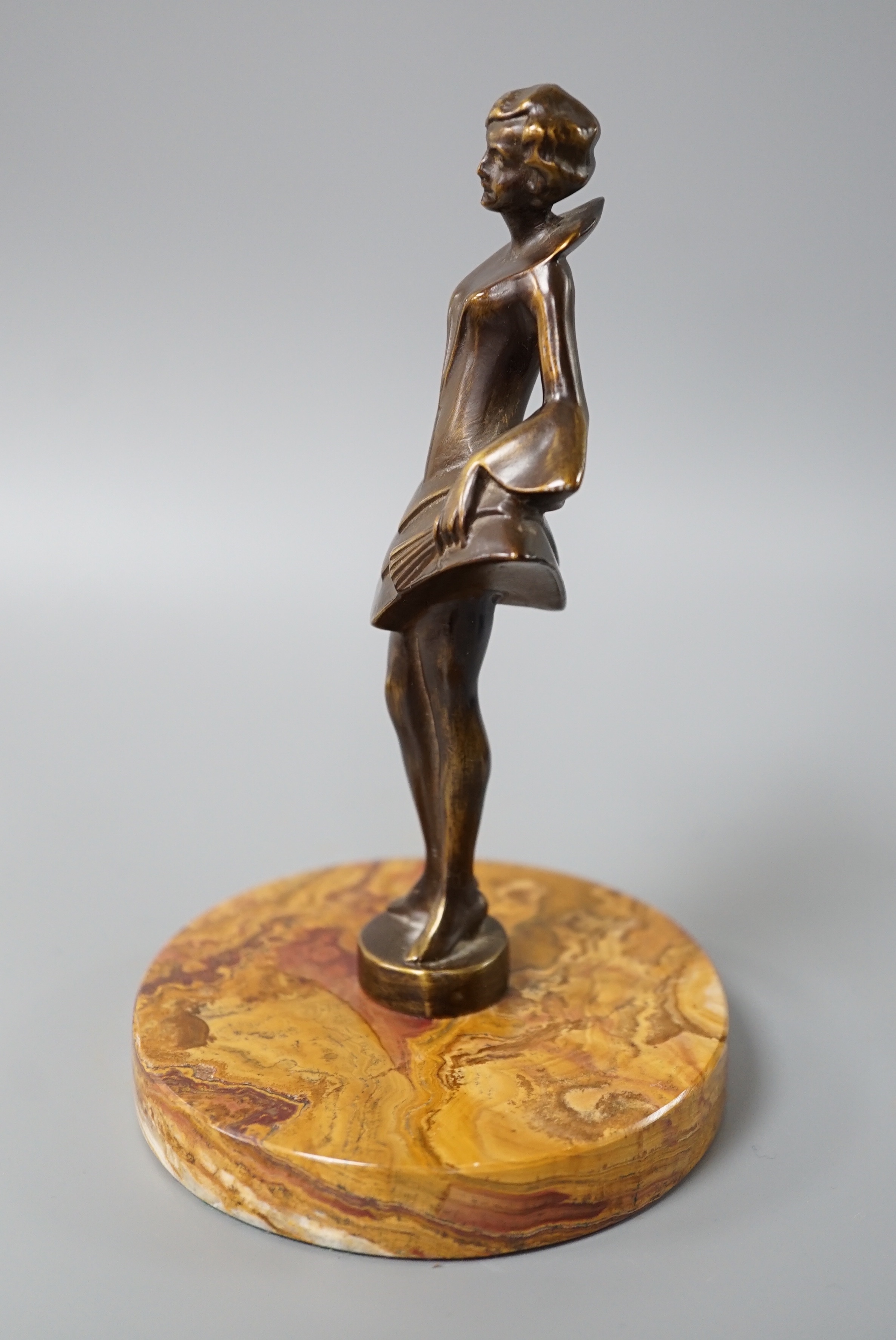 An Art Deco style bronze figure of a woman, 17 cms high.